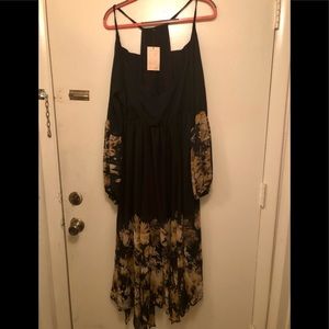 Flowing summer black and gold dress lightly lined
